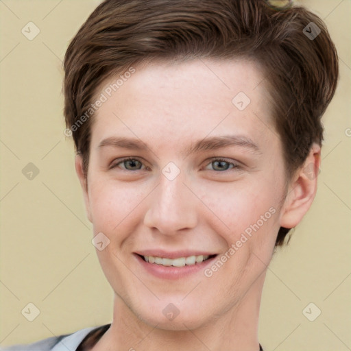 Joyful white young-adult female with short  brown hair and grey eyes