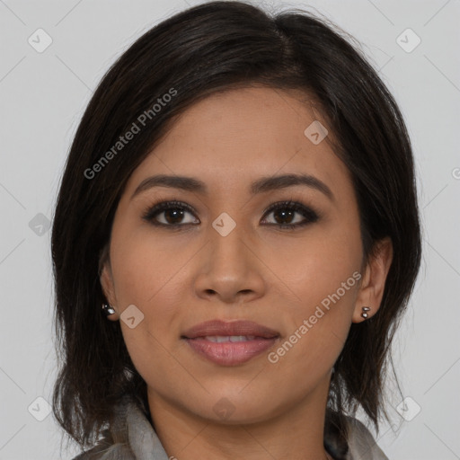 Joyful latino young-adult female with long  brown hair and brown eyes