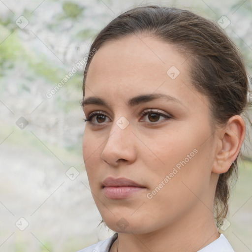 Neutral white young-adult female with medium  brown hair and brown eyes