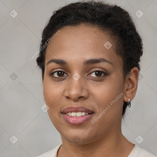 Joyful latino young-adult female with short  brown hair and brown eyes