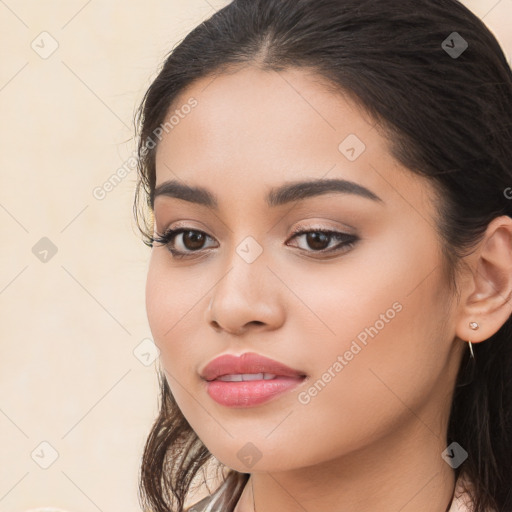 Neutral white young-adult female with long  brown hair and brown eyes