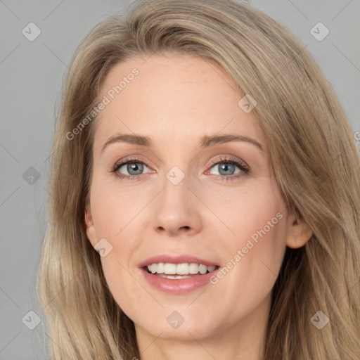 Joyful white adult female with long  brown hair and grey eyes