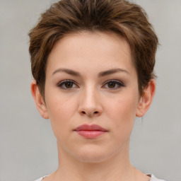 Neutral white young-adult female with short  brown hair and brown eyes