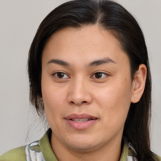 Joyful white young-adult female with medium  brown hair and brown eyes