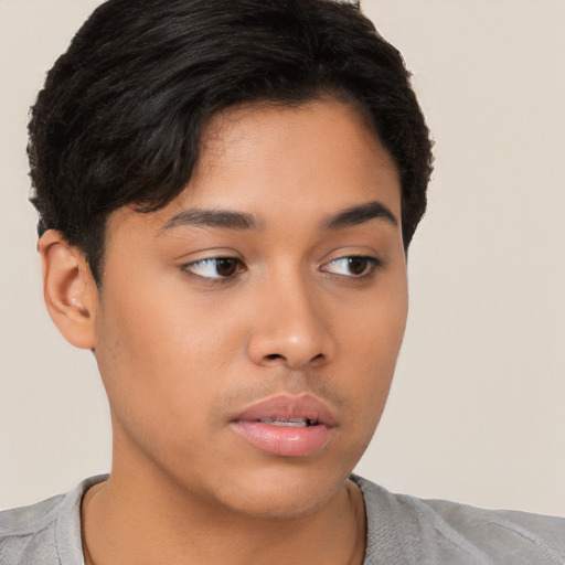 Neutral latino young-adult male with short  brown hair and brown eyes