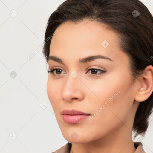 Neutral white young-adult female with medium  brown hair and brown eyes