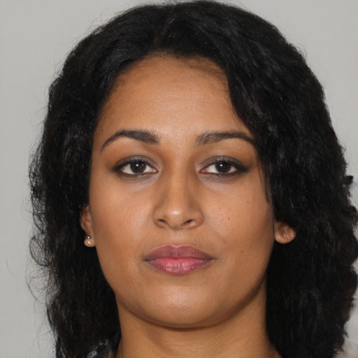 Neutral black young-adult female with long  black hair and brown eyes
