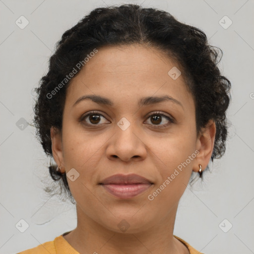 Joyful latino adult female with short  brown hair and brown eyes