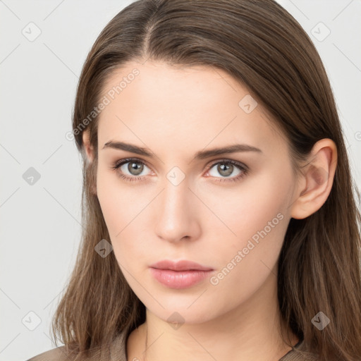 Neutral white young-adult female with long  brown hair and brown eyes