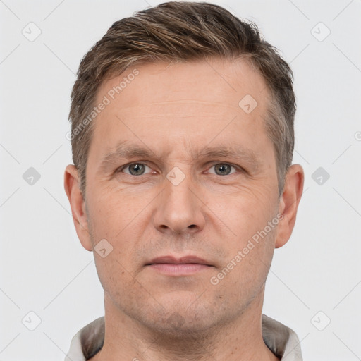 Neutral white adult male with short  brown hair and brown eyes