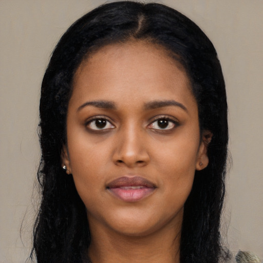 Neutral latino young-adult female with long  black hair and brown eyes