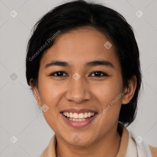 Joyful asian young-adult female with medium  black hair and brown eyes