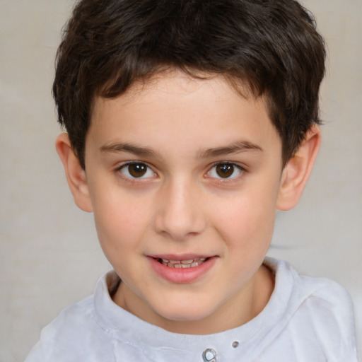 Joyful white child male with short  brown hair and brown eyes