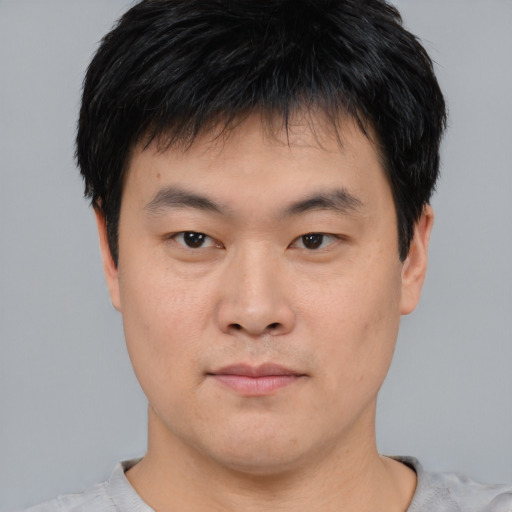 Neutral asian young-adult male with short  black hair and brown eyes