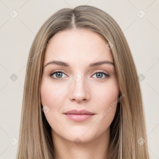 Neutral white young-adult female with long  brown hair and brown eyes