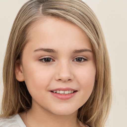 Joyful white child female with long  brown hair and brown eyes