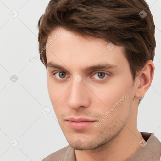 Neutral white young-adult male with short  brown hair and brown eyes