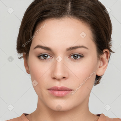 Neutral white young-adult female with short  brown hair and brown eyes