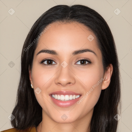 Joyful white young-adult female with long  black hair and brown eyes