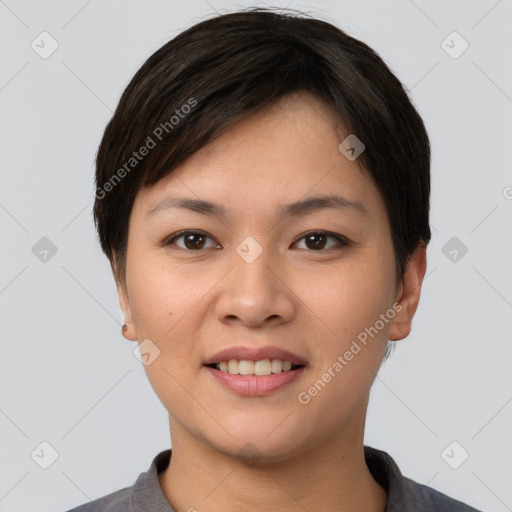 Joyful asian young-adult female with short  brown hair and brown eyes