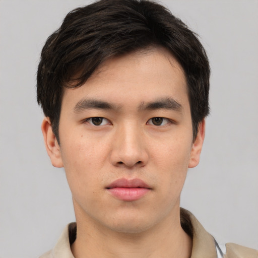 Neutral asian young-adult male with short  brown hair and brown eyes