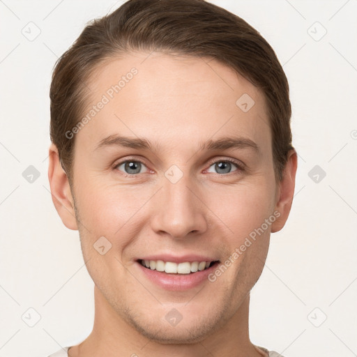 Joyful white young-adult female with short  brown hair and grey eyes