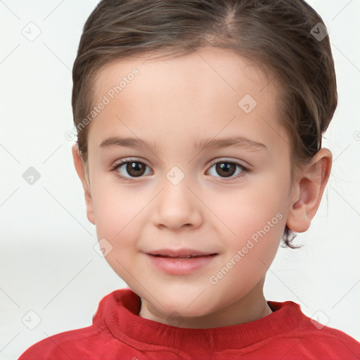 Joyful white child female with short  brown hair and brown eyes