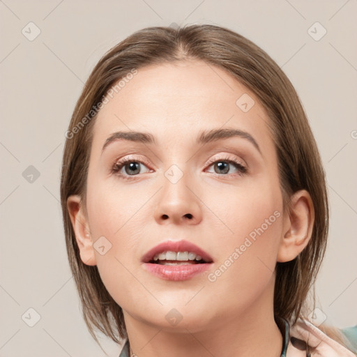 Neutral white young-adult female with medium  brown hair and grey eyes