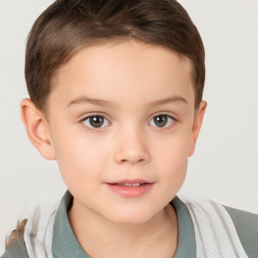 Joyful white child female with short  brown hair and brown eyes