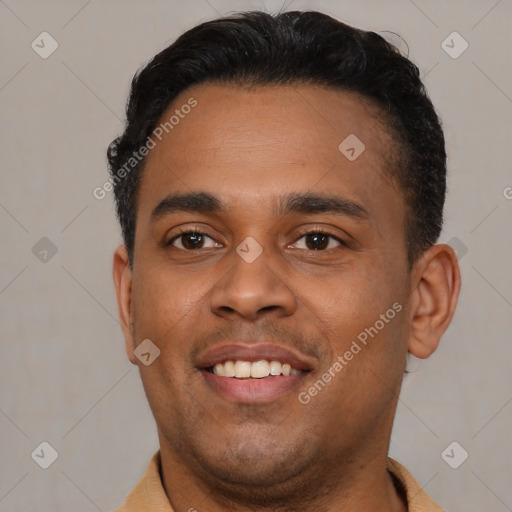 Joyful latino young-adult male with short  brown hair and brown eyes