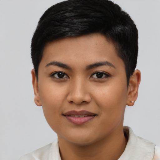 Joyful asian young-adult female with short  brown hair and brown eyes