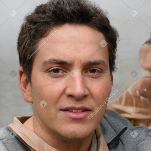 Joyful white adult male with short  brown hair and grey eyes