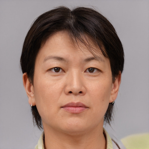 Neutral white adult female with medium  brown hair and brown eyes