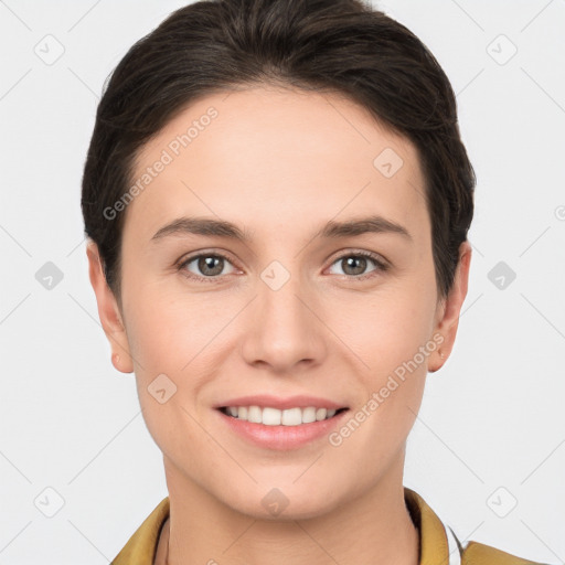 Joyful white young-adult female with short  brown hair and brown eyes