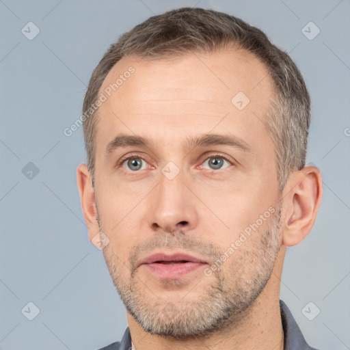 Neutral white adult male with short  brown hair and brown eyes