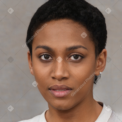 Joyful black young-adult female with short  black hair and brown eyes