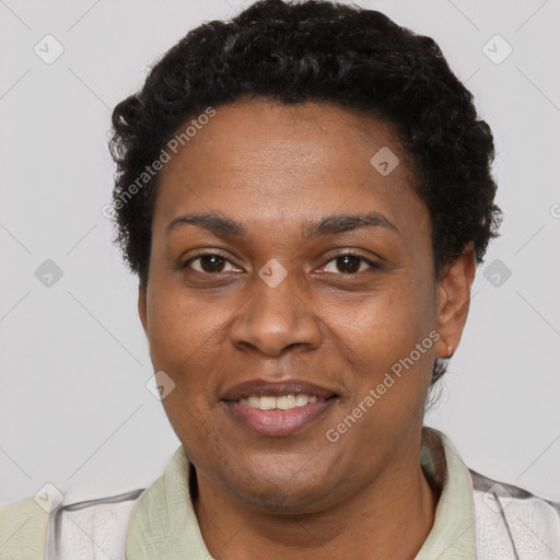 Joyful black adult female with short  brown hair and brown eyes