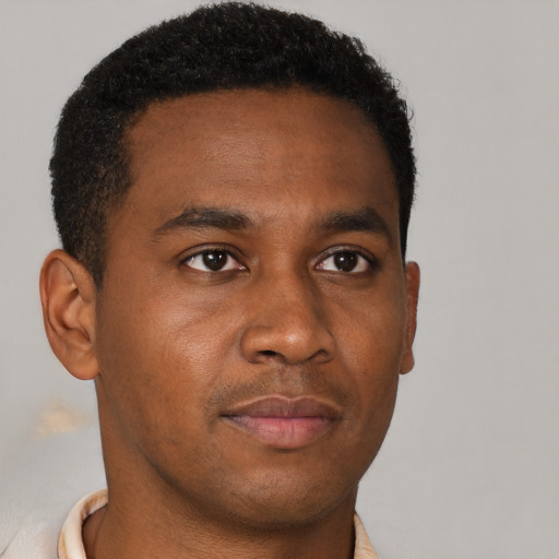 Neutral black young-adult male with short  brown hair and brown eyes