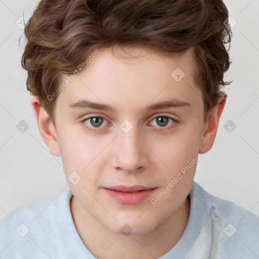 Joyful white child male with short  brown hair and brown eyes