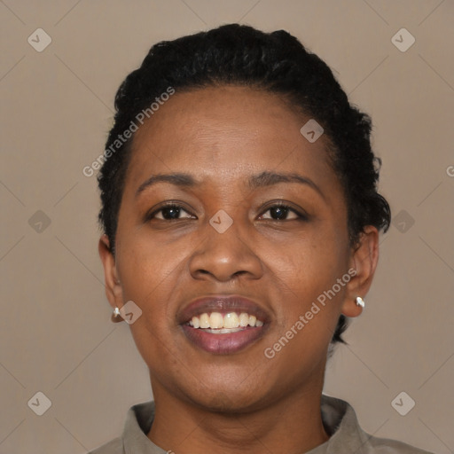 Joyful black young-adult female with short  black hair and brown eyes