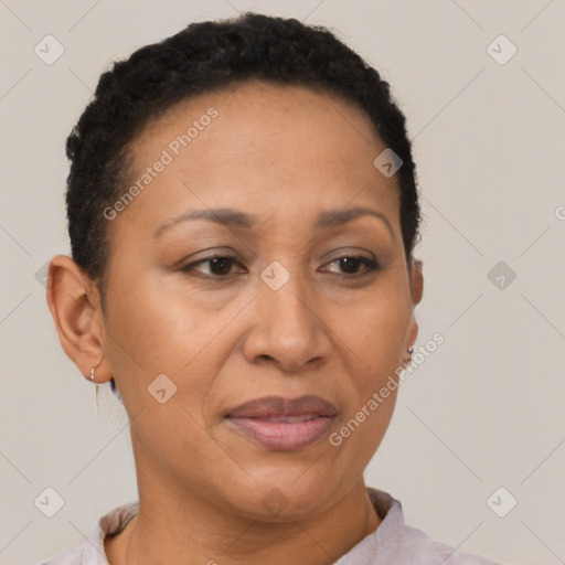 Joyful black adult female with short  brown hair and brown eyes