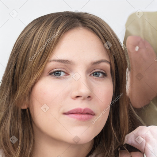 Neutral white young-adult female with medium  brown hair and grey eyes