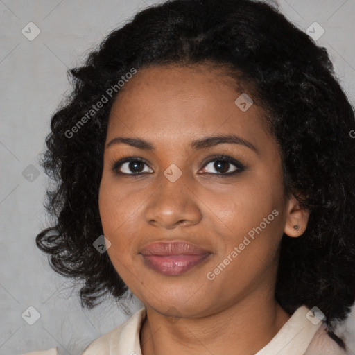 Joyful black young-adult female with medium  black hair and brown eyes