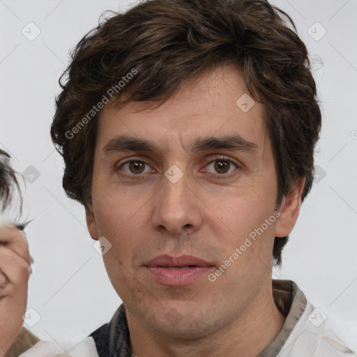 Neutral white adult male with short  brown hair and brown eyes