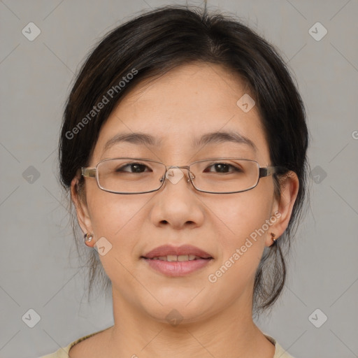 Joyful asian adult female with medium  brown hair and brown eyes