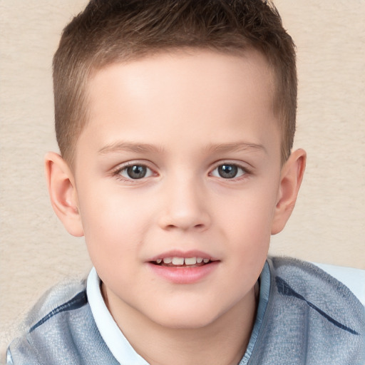 Joyful white child male with short  brown hair and brown eyes