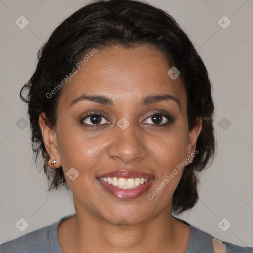 Joyful black young-adult female with medium  brown hair and brown eyes