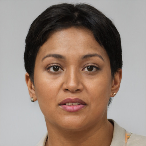 Joyful asian adult female with short  brown hair and brown eyes