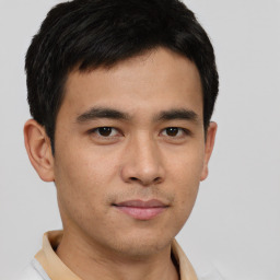 Neutral asian young-adult male with short  brown hair and brown eyes