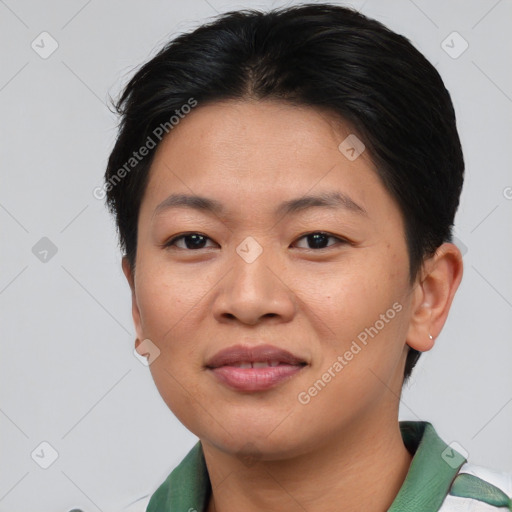 Joyful asian young-adult female with short  brown hair and brown eyes